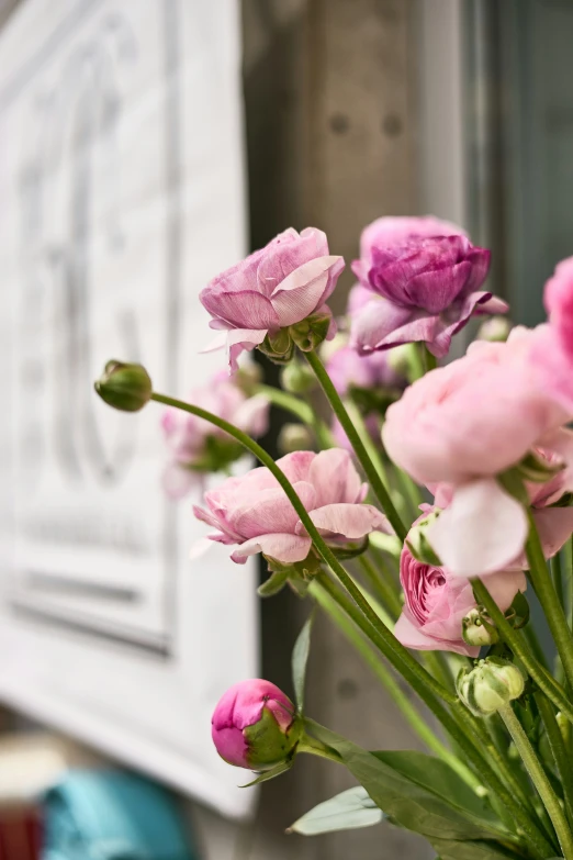 a vase with some pretty flowers in it