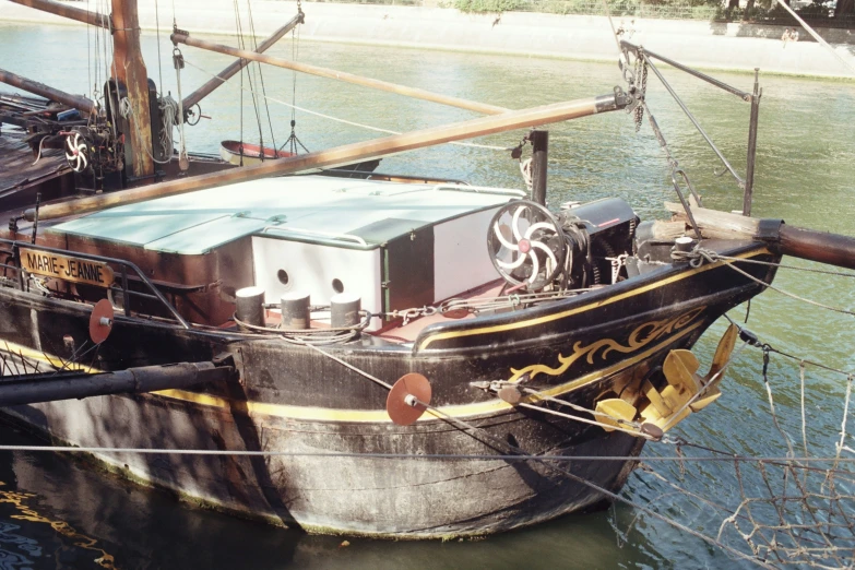 a pirate ship is moored in the water