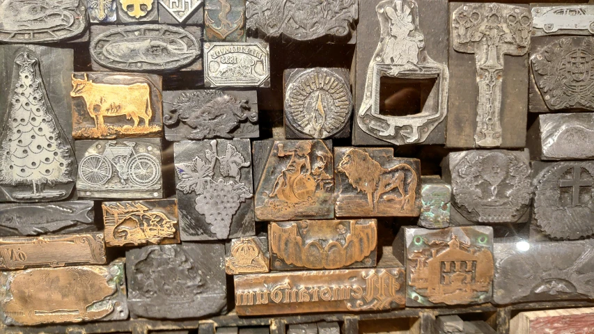 a close up image of metal objects with designs