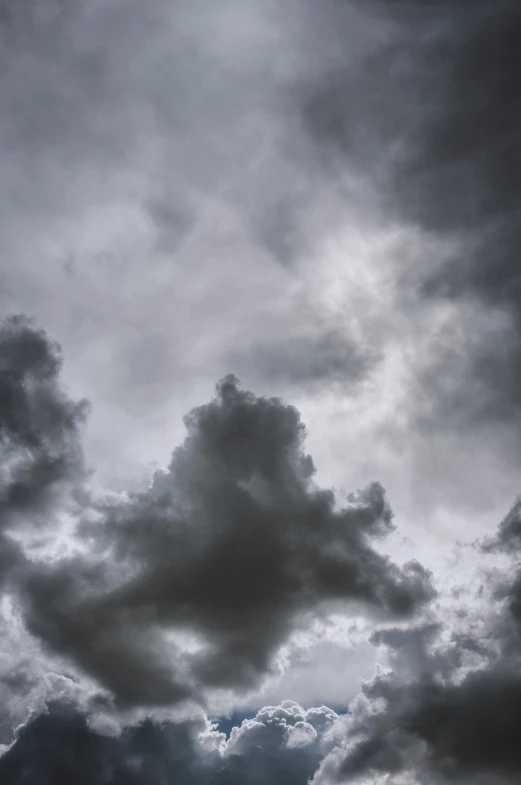 a cloudy sky filled with dark gray clouds