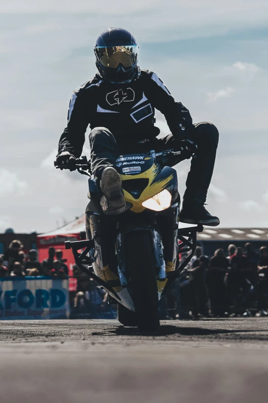 a person riding a motorcycle during a race