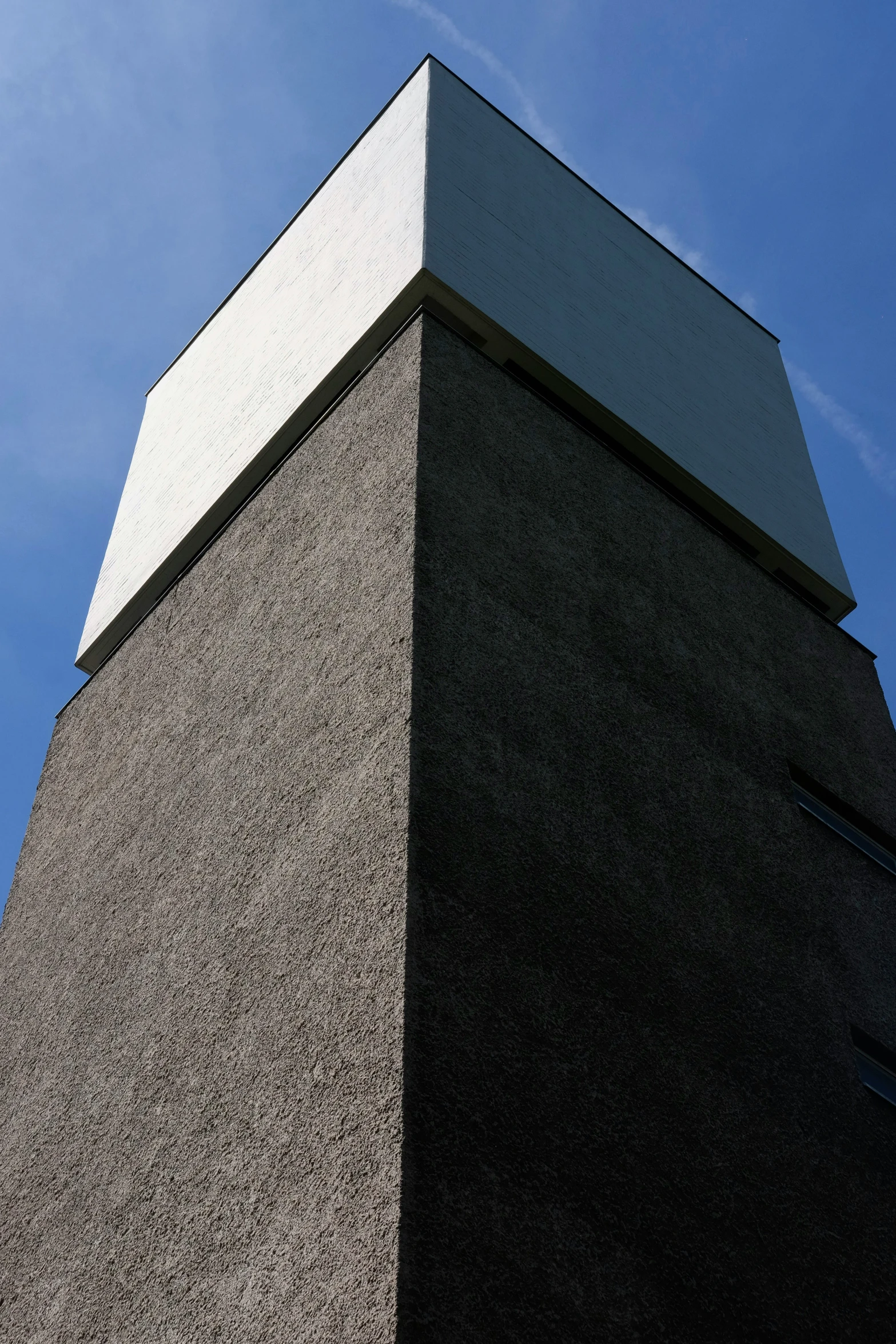 a tall building with a clock on the side of it