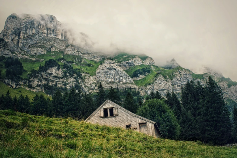 the roof of an old building with mist coming off of it