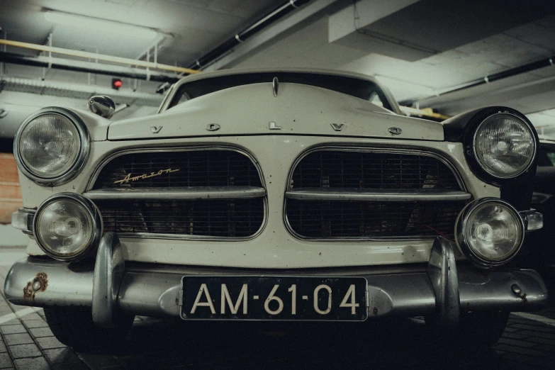 front end of old car in the garage