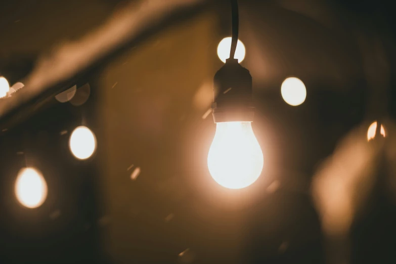 some light bulbs that are hanging on the ceiling