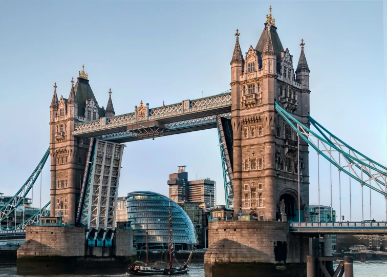 a picture of the tower bridge from across the river