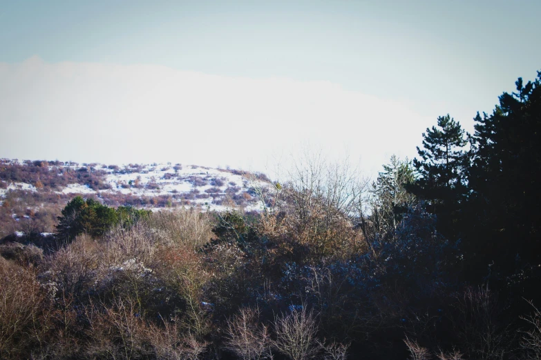 a mountain with no trees in it in the day