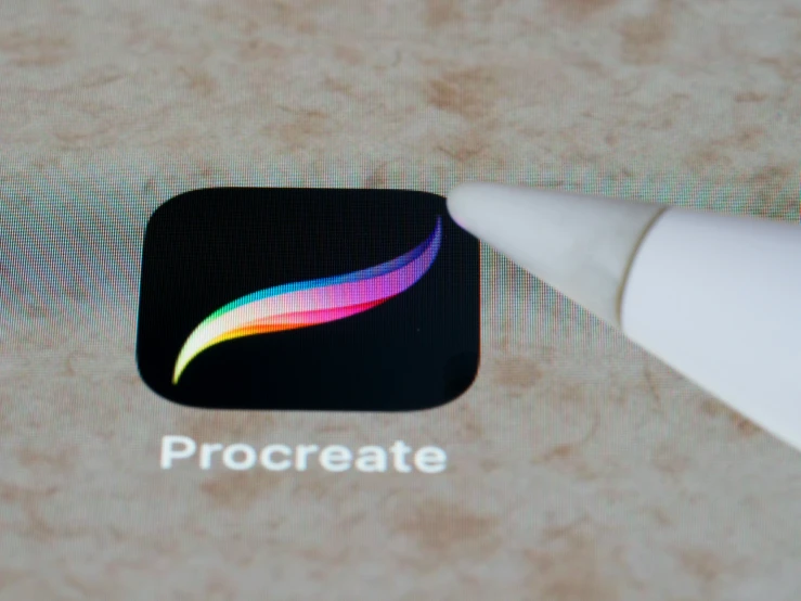 an app icon that has the words procreate in a small square