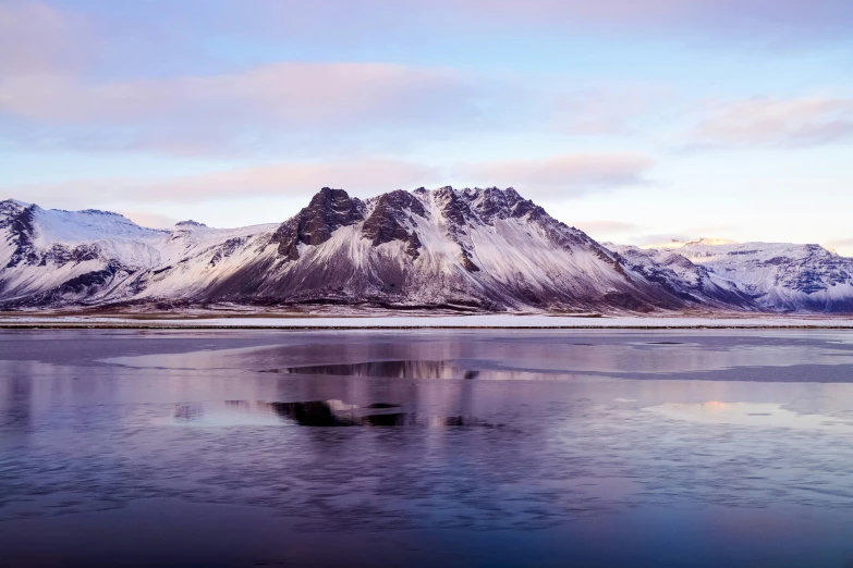 ice is covering the surface of a lake