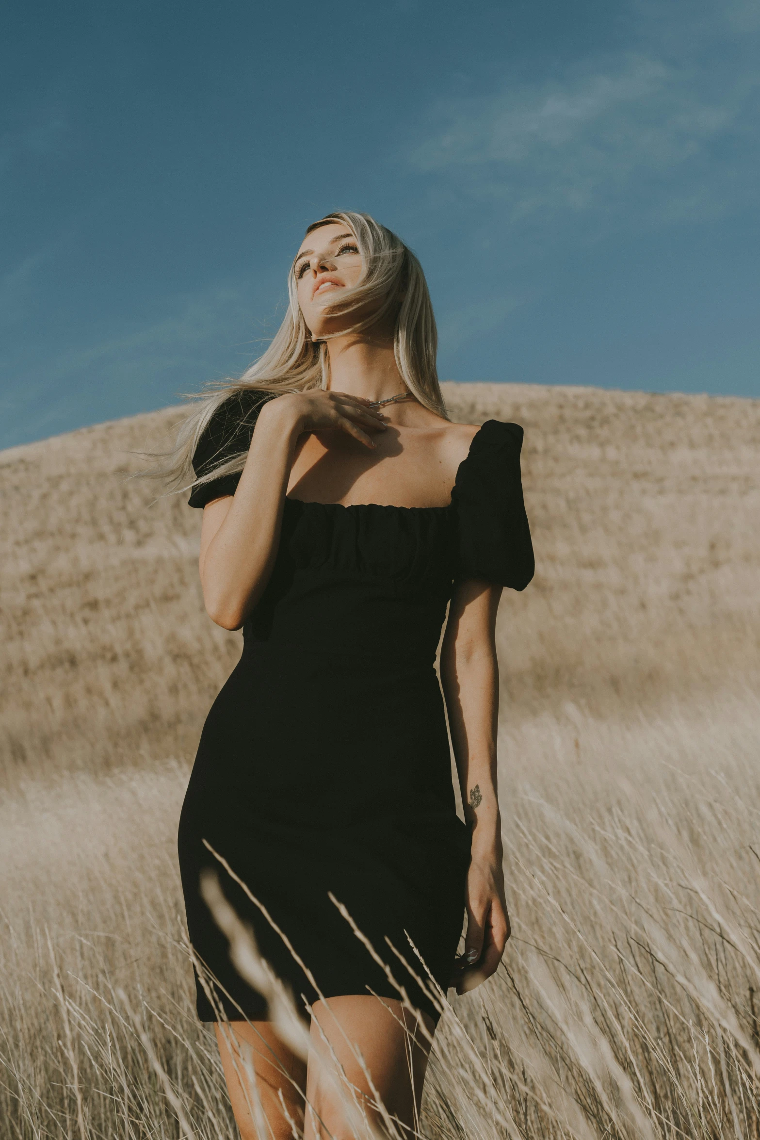 an image of a woman in the middle of a field