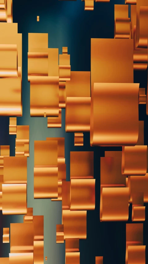 a gold abstract wall made up of rolls of paper