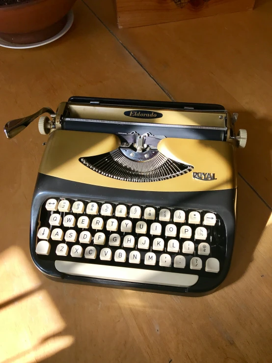 an old fashioned manual typewriter with many keys