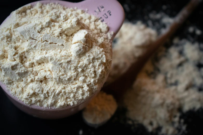 powdered food items inside a measuring cup