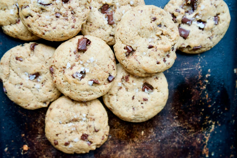 cookies sitting on top of a baking tray