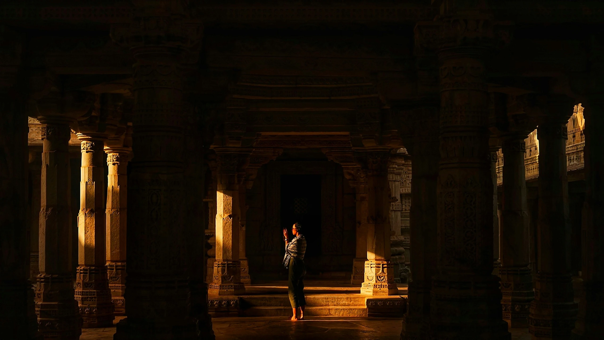 a woman in a building alone at night