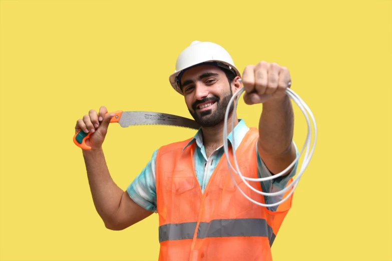 a man in a construction uniform holding an instrument