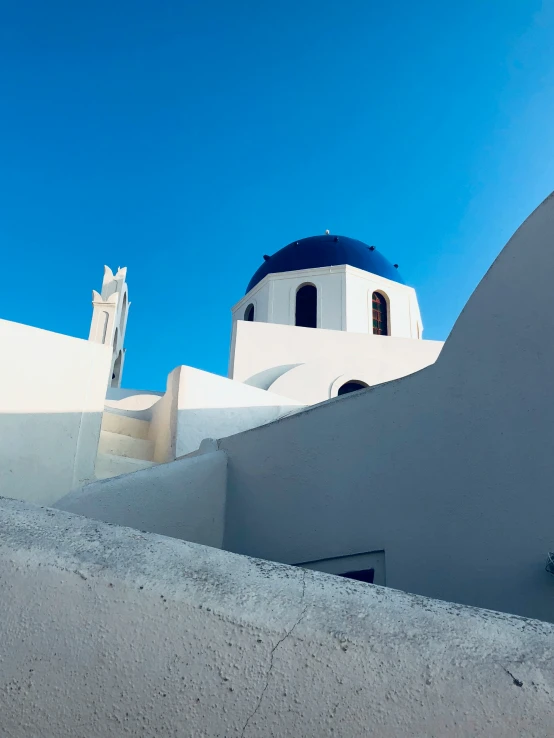 some very pretty houses with white architecture on them