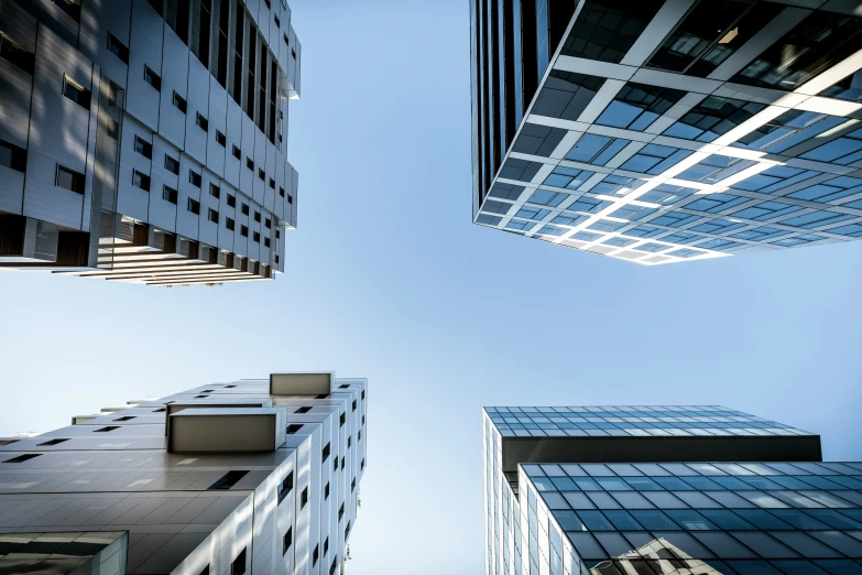 some very tall buildings towering in the sky