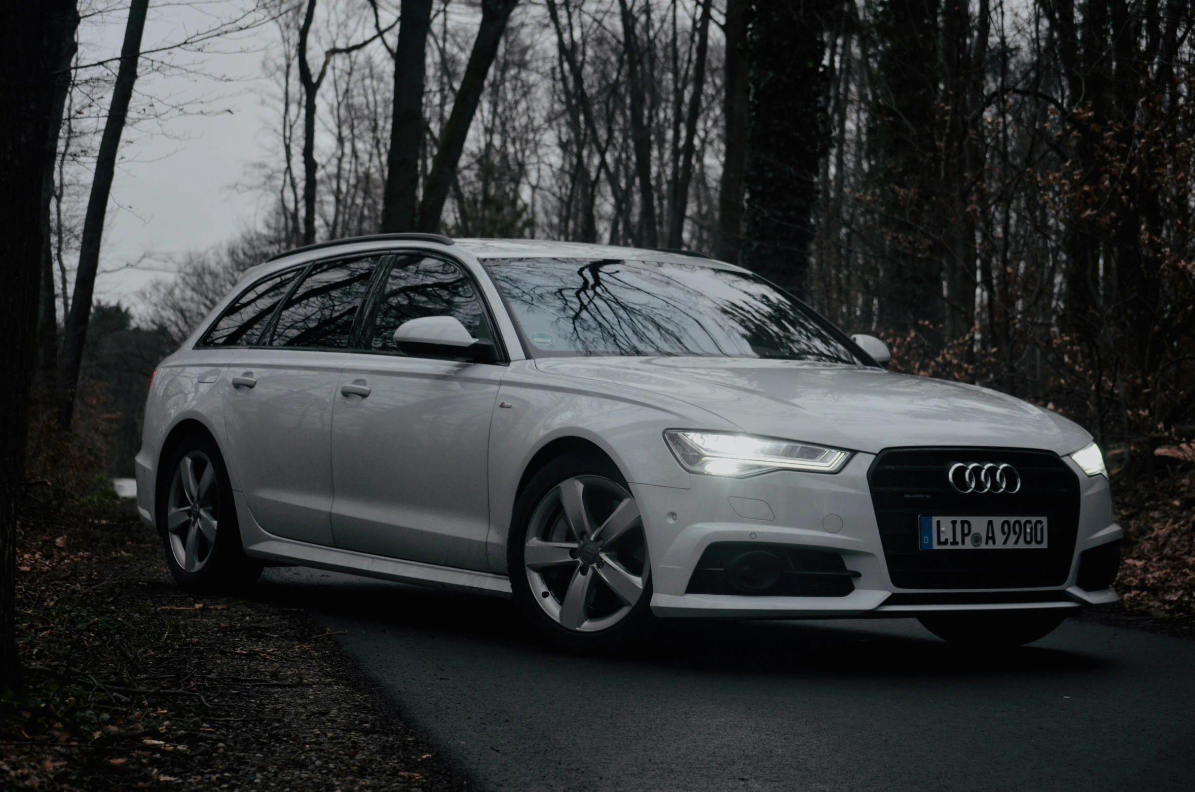 an audi in the middle of a road