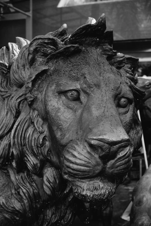 black and white po of a lion statue
