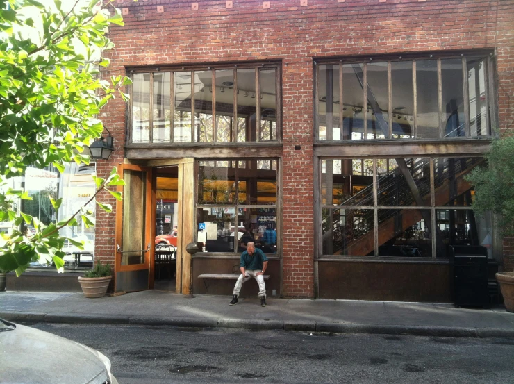 a couple of people standing in front of a building