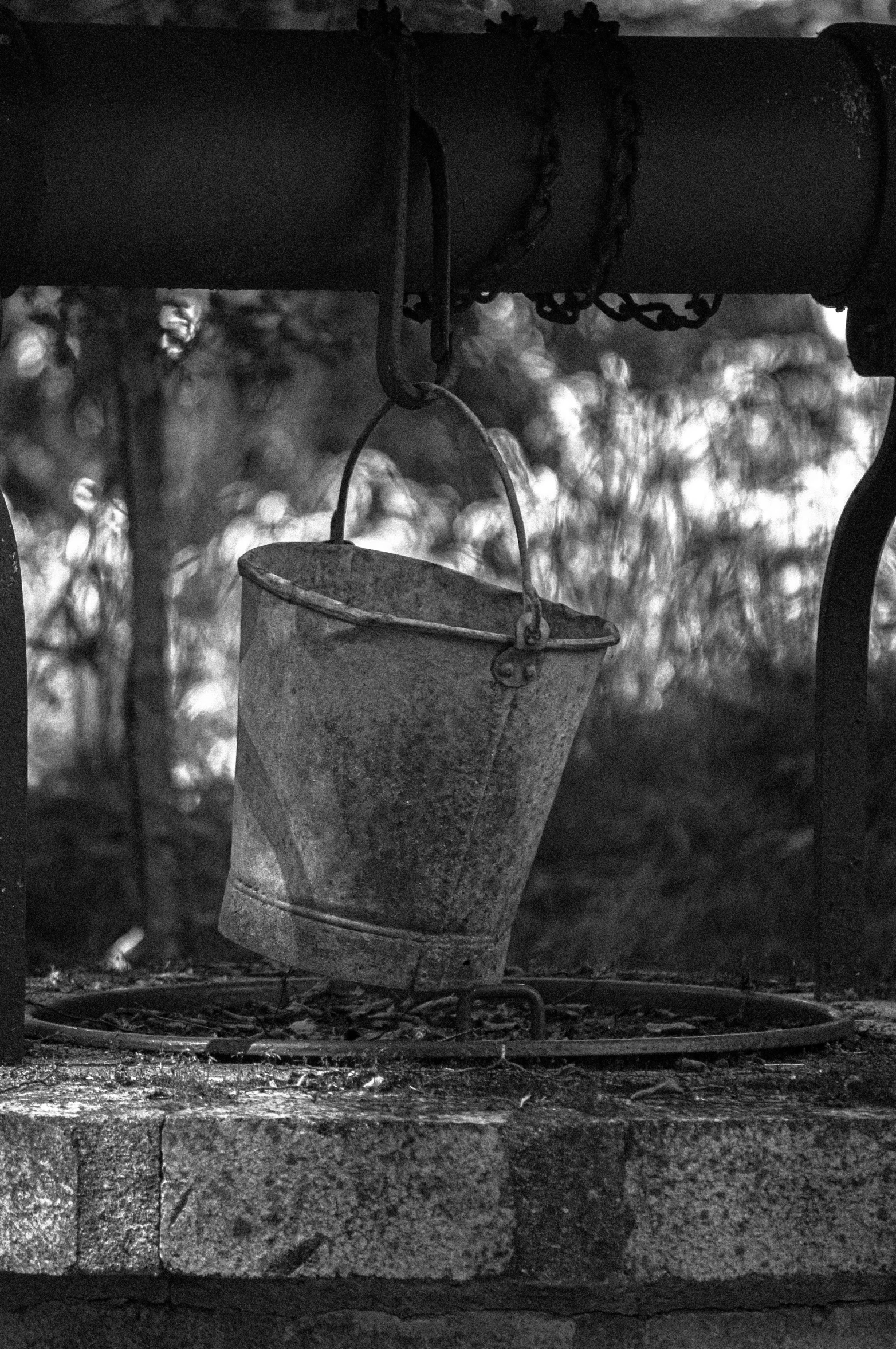 black and white pograph of a woman and buckets