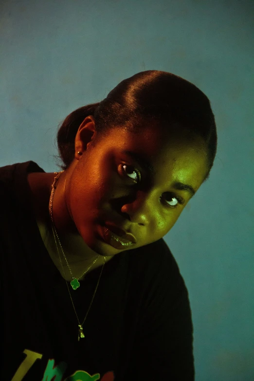 a girl in black shirt and blue background