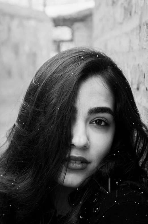 black and white portrait of a woman with long hair