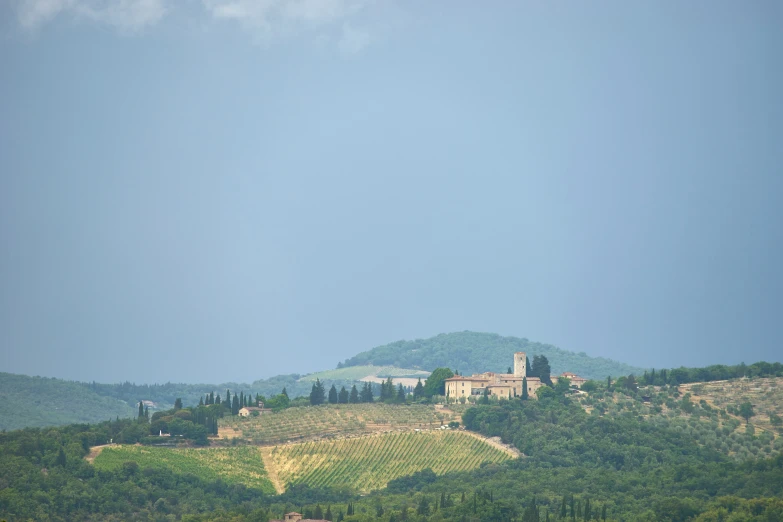 hills and buildings are featured in this pograph