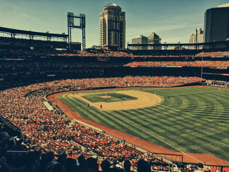 an inside view of a stadium with people in it