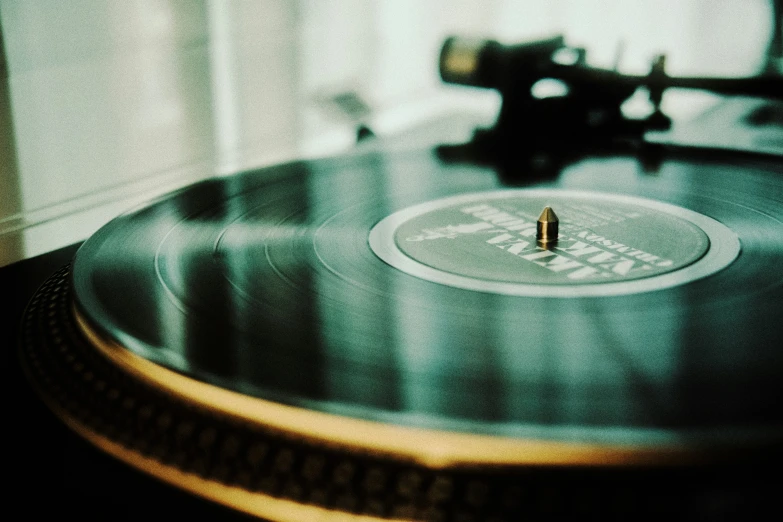 a record player's turntable that is sitting on a table