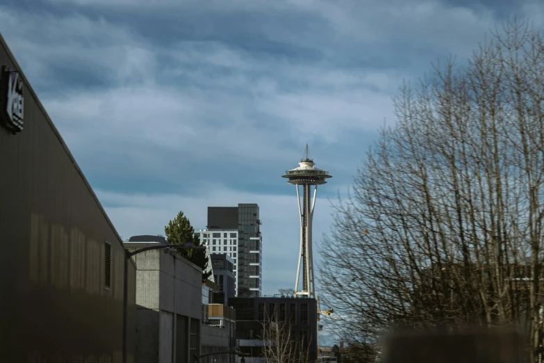 tall metal building with a clock in the top