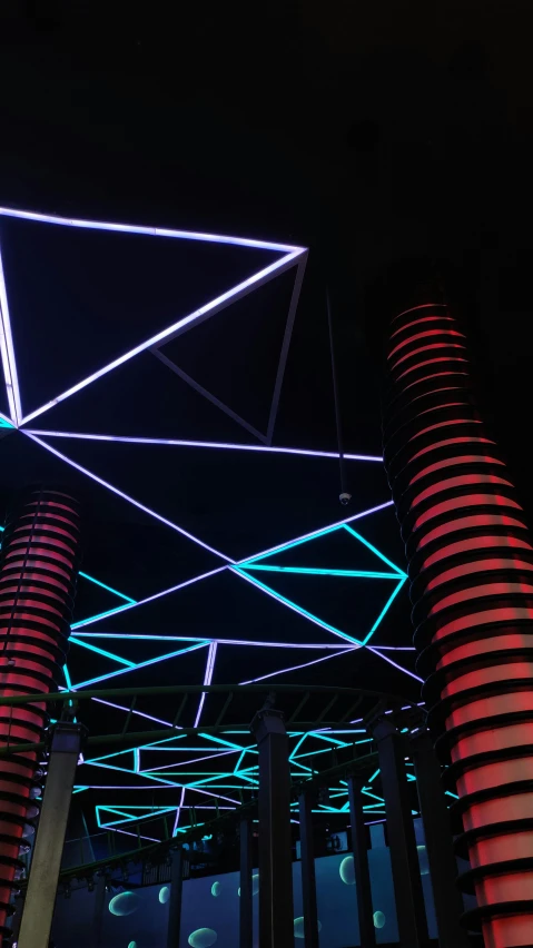 lights glow up above a group of round pillars