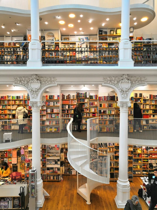 a very large and well decorated bookstore with books
