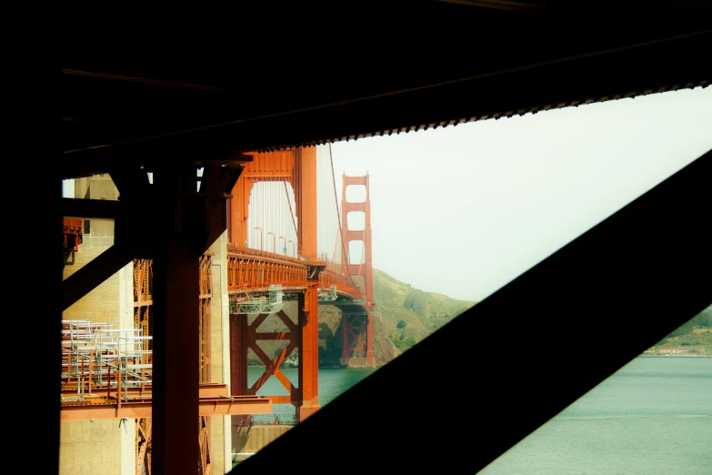 the golden gate bridge viewed from beneath