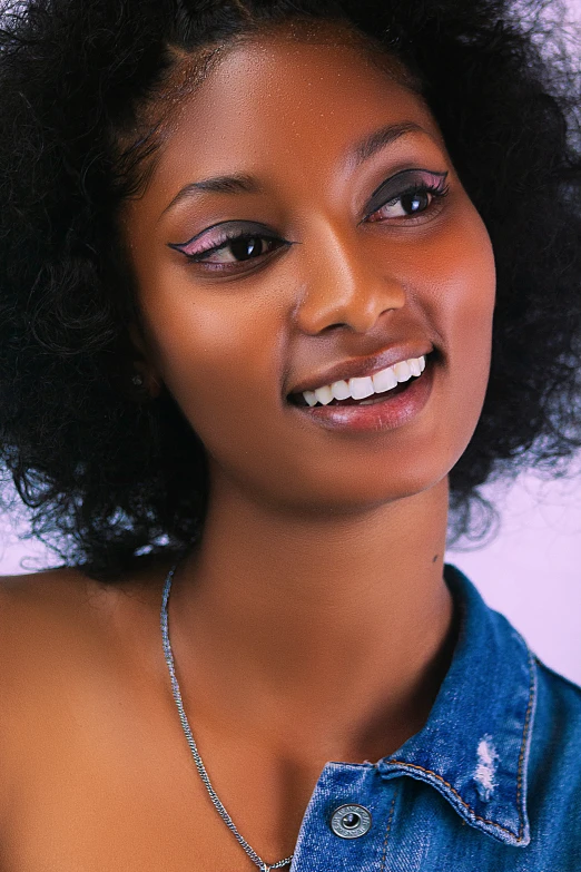 a young woman is smiling while posing for a po