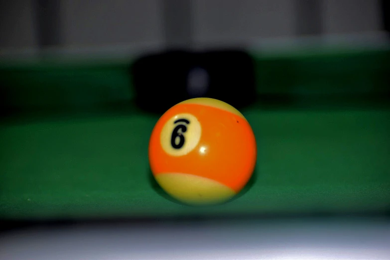 orange billiard ball is set to be released to the referee