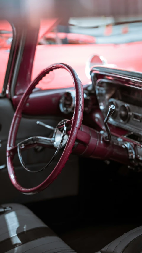 the dashboard of a small car with the dash light on