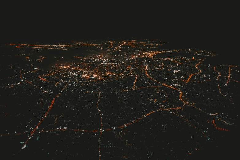 an aerial po of an earth surface with a bright lights