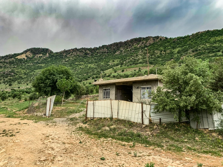 there is a shack up on the side of a road