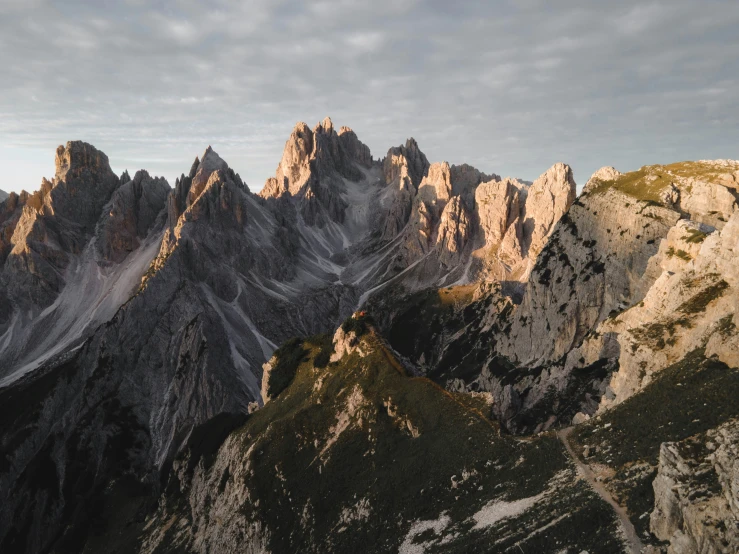 a bird flies over a mountain range