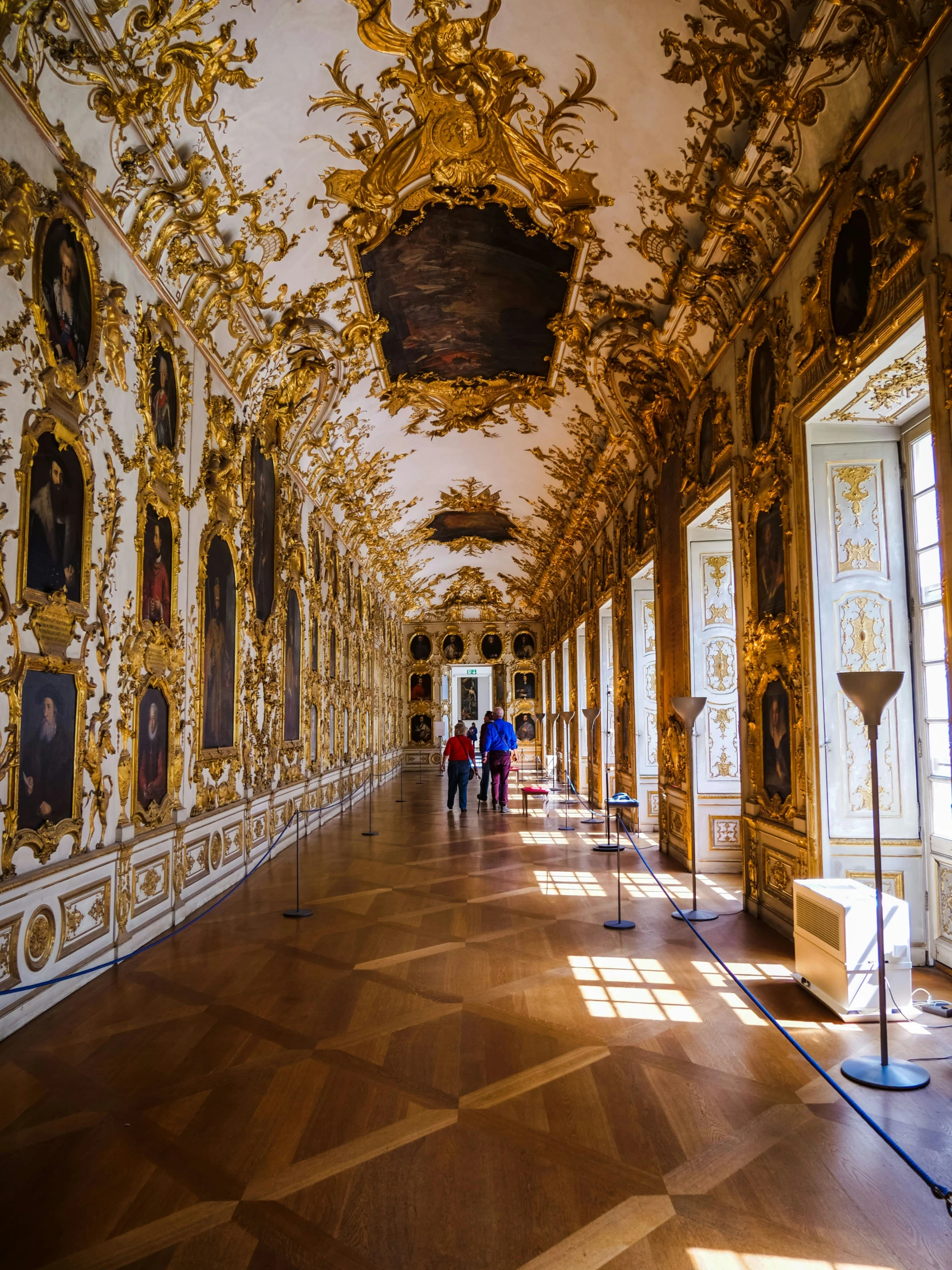 the walls and ceiling in this building are decorated with intricately gilded paint