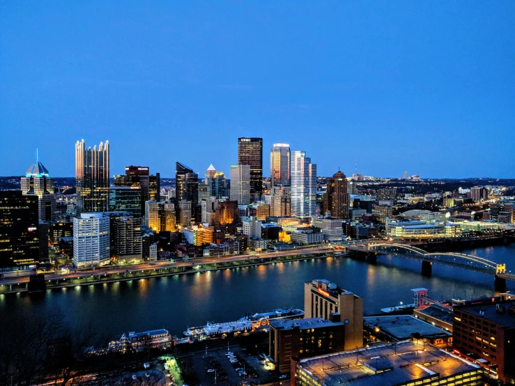 the view of the city skyline of a large body of water