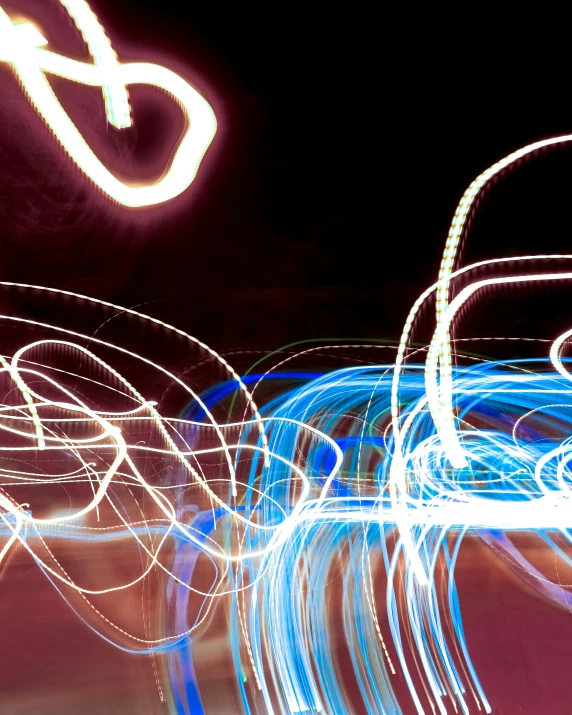 a long exposure pograph of an airplane in the sky