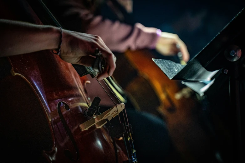 a person with an instrument holding it up