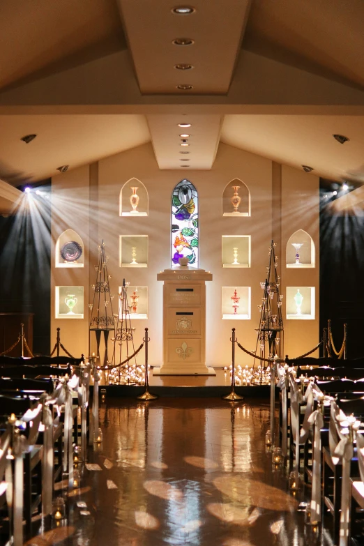 the interior of a church decorated for a wedding