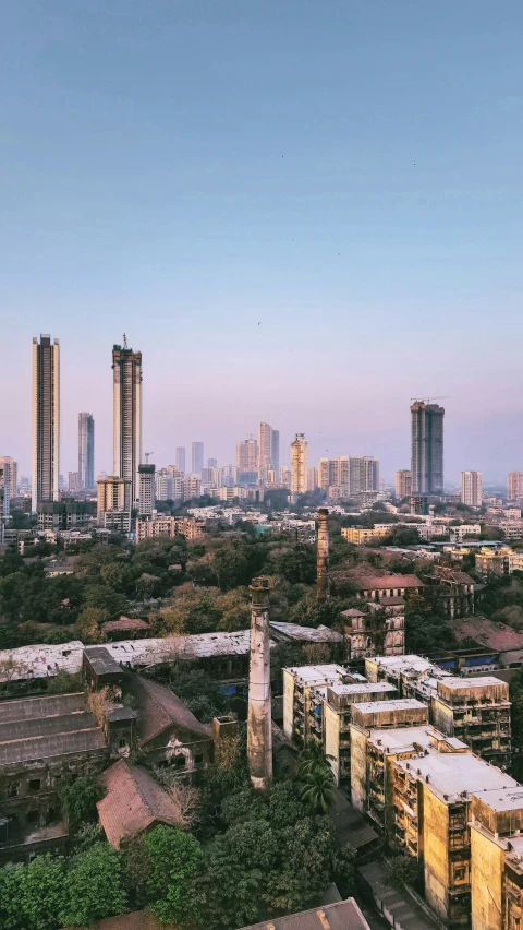 a cityscape with skyscrs and tall buildings behind