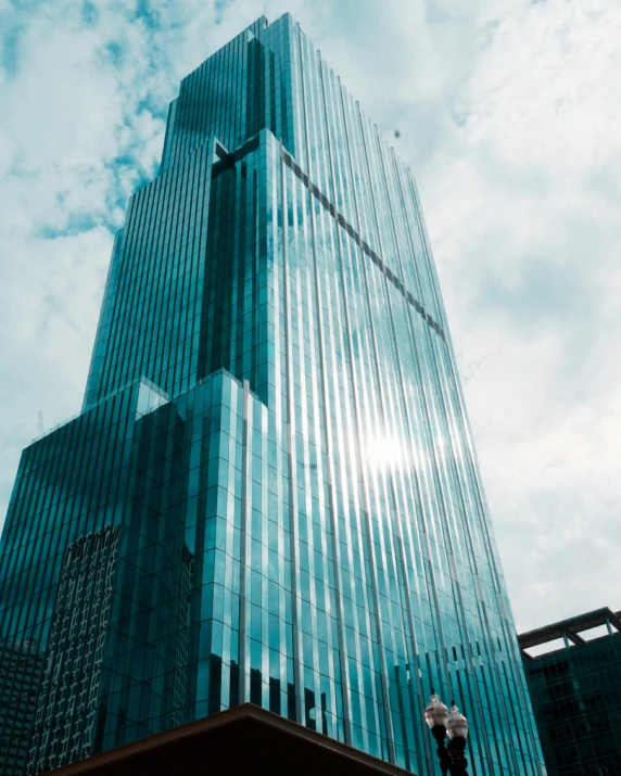 a very tall building sitting on the side of a street