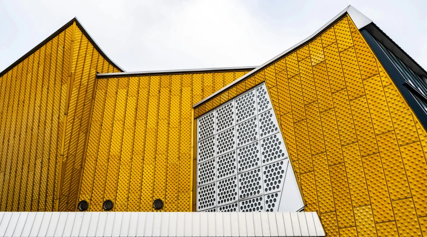 two large building's against a blue sky