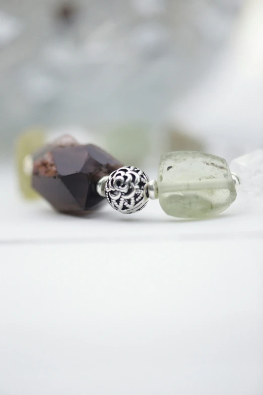 a couple of glass beads sitting next to each other